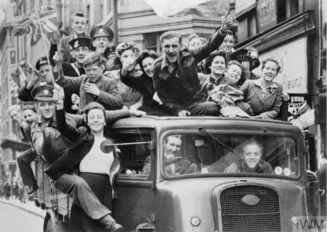 Celebrations on VE Day - people on a lorry