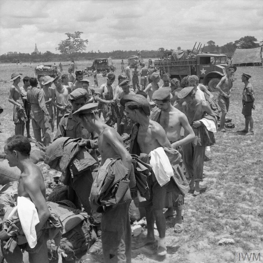 Liberated POWs at Pegu (Burma) pick up new kit following their release. 3 May 1945. Photo: Imperial War Museums