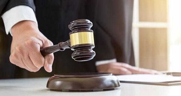 Judge: ‘You have a choice – your husband or your guns’