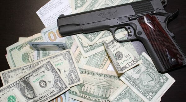 Gun Store Owner Defends Approval of Biden Background Check Rule
