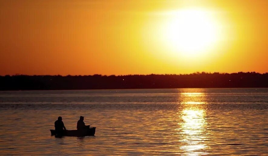 Wisconsin agrees to drop ban on carrying firearms while fishing following challenge
